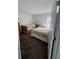 Bedroom with two beds and access to bathroom at 4704 Delray Beach Ct, Kissimmee, FL 34746