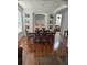 Formal dining room with hardwood floors and built-in shelving at 4704 Delray Beach Ct, Kissimmee, FL 34746