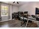Home office with desk, chair, and ample storage for shoes and other items at 7270 Westpointe Blvd # 914, Orlando, FL 32835