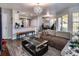 Open concept living and kitchen area with hardwood floors at 7270 Westpointe Blvd # 914, Orlando, FL 32835