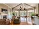Spacious community clubhouse lobby with hardwood floors, fireplace and large windows at 7270 Westpointe Blvd # 914, Orlando, FL 32835