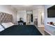 Main bedroom with king bed, en-suite bathroom access at 7270 Westpointe Blvd # 914, Orlando, FL 32835