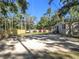 Gravel driveway with parking for multiple vehicles at 1257 Mullet Lake Park Rd, Geneva, FL 32732