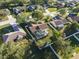 Aerial view showing the house and surrounding neighborhood at 13303 Pinyon Dr, Clermont, FL 34711