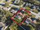 Aerial view showcasing the home's backyard, pool, and neighborhood setting at 13303 Pinyon Dr, Clermont, FL 34711