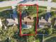Aerial view showing home's location, pool, and surrounding neighborhood at 13303 Pinyon Dr, Clermont, FL 34711