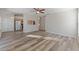 Bright living room featuring wood-look floors at 13303 Pinyon Dr, Clermont, FL 34711