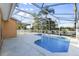 Relaxing screened pool and patio with ample space at 13303 Pinyon Dr, Clermont, FL 34711