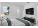 Spacious bedroom with large TV, and access to balcony at 15211 Willow Arbor Cir, Orlando, FL 32824