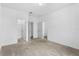 Bedroom with carpet flooring and access to other rooms at 15211 Willow Arbor Cir, Orlando, FL 32824