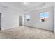 Another bedroom with neutral walls and carpeting, and a closet at 15211 Willow Arbor Cir, Orlando, FL 32824