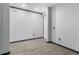 Empty foyer with wood floors and gray walls at 15211 Willow Arbor Cir, Orlando, FL 32824