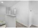 Upstairs hallway with carpeted floor and access to bedrooms at 15211 Willow Arbor Cir, Orlando, FL 32824