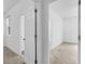 View of hallway with access to bedrooms at 15211 Willow Arbor Cir, Orlando, FL 32824
