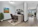 Bright home office with desk, chair, and built-in shelving at 15211 Willow Arbor Cir, Orlando, FL 32824