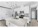 Modern kitchen with stainless steel appliances and an island at 15211 Willow Arbor Cir, Orlando, FL 32824