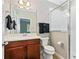 Clean bathroom with vanity, toilet, shower, and modern fixtures at 1940 Lobelia Dr, Lake Mary, FL 32746