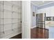 Walk-in pantry with ample shelving for storage at 1940 Lobelia Dr, Lake Mary, FL 32746