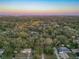 Community overview showcasing lush tree coverage and suburban homes at 2801 Kinnon Dr, Orlando, FL 32817