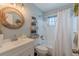 Clean bathroom with a white vanity, tub, and shower at 3076 Crane Strand Dr, Winter Park, FL 32792