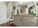 Modern bathroom with granite vanity and a shower/tub combo at 3214 Gold Ln, Kissimmee, FL 34747