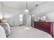 Bedroom with king-size bed and built-in dresser at 3214 Gold Ln, Kissimmee, FL 34747
