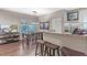 Bright kitchen with granite countertops, stainless steel appliances, and an island at 3214 Gold Ln, Kissimmee, FL 34747