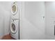 Stackable washer and dryer in a convenient laundry closet at 3214 Gold Ln, Kissimmee, FL 34747