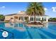 Resort-style community pool with clubhouse in the background at 3214 Gold Ln, Kissimmee, FL 34747