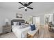 Main bedroom with wood flooring, a ceiling fan, and a neutral color palette at 5016 Dorman Rd, Lakeland, FL 33813