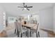 Dining room features a wood table with six chairs and hardwood floors at 5016 Dorman Rd, Lakeland, FL 33813
