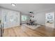 Bright dining room with hardwood floors and view to living room at 5016 Dorman Rd, Lakeland, FL 33813