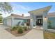 Inviting home exterior with a covered entryway and well-maintained landscaping at 5016 Dorman Rd, Lakeland, FL 33813