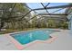 Inviting screened pool area with a spacious deck at 5016 Dorman Rd, Lakeland, FL 33813