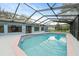 Inviting screened-in pool with ample deck space at 5016 Dorman Rd, Lakeland, FL 33813