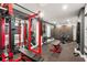 Well-equipped home gym with various exercise machines and weightlifting equipment at 510 Cocoa Ln, Orlando, FL 32804