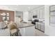 Modern kitchen island with granite countertop and breakfast bar at 1115 Patriot Loop, Haines City, FL 33844