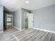 Bedroom with access to a full bathroom at 143 N Woodward Ave, Deland, FL 32720
