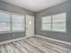 Bright entryway with new flooring and neutral walls at 143 N Woodward Ave, Deland, FL 32720