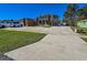 House exterior with a large driveway and landscaping at 2505 Hillside Ave, Orange City, FL 32763