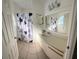 Clean bathroom with shower and vanity at 2749 N Poinciana Blvd # 16, Kissimmee, FL 34746