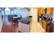 Open kitchen boasting granite countertops, stainless steel appliances, and a breakfast bar at 2749 N Poinciana Blvd # 16, Kissimmee, FL 34746