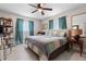 Comfortable bedroom with a king-size bed and neutral color scheme at 47 Community Dr, Debary, FL 32713