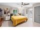 Bright bedroom with a king-size bed and en-suite bathroom access at 47 Community Dr, Debary, FL 32713