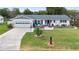 Charming ranch home with 2-car garage and curb appeal at 47 Community Dr, Debary, FL 32713