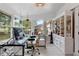 Bright home office with built-in shelving and large window at 47 Community Dr, Debary, FL 32713