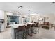 Open kitchen with large island, white cabinets and breakfast nook at 47 Community Dr, Debary, FL 32713