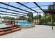 Refreshing above ground pool with screened enclosure at 47 Community Dr, Debary, FL 32713