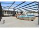 Inviting above ground pool with covered patio at 47 Community Dr, Debary, FL 32713
