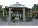 Gazebo with grilling station and seating near the community pool at 6106 Westgate Dr # 102, Orlando, FL 32835